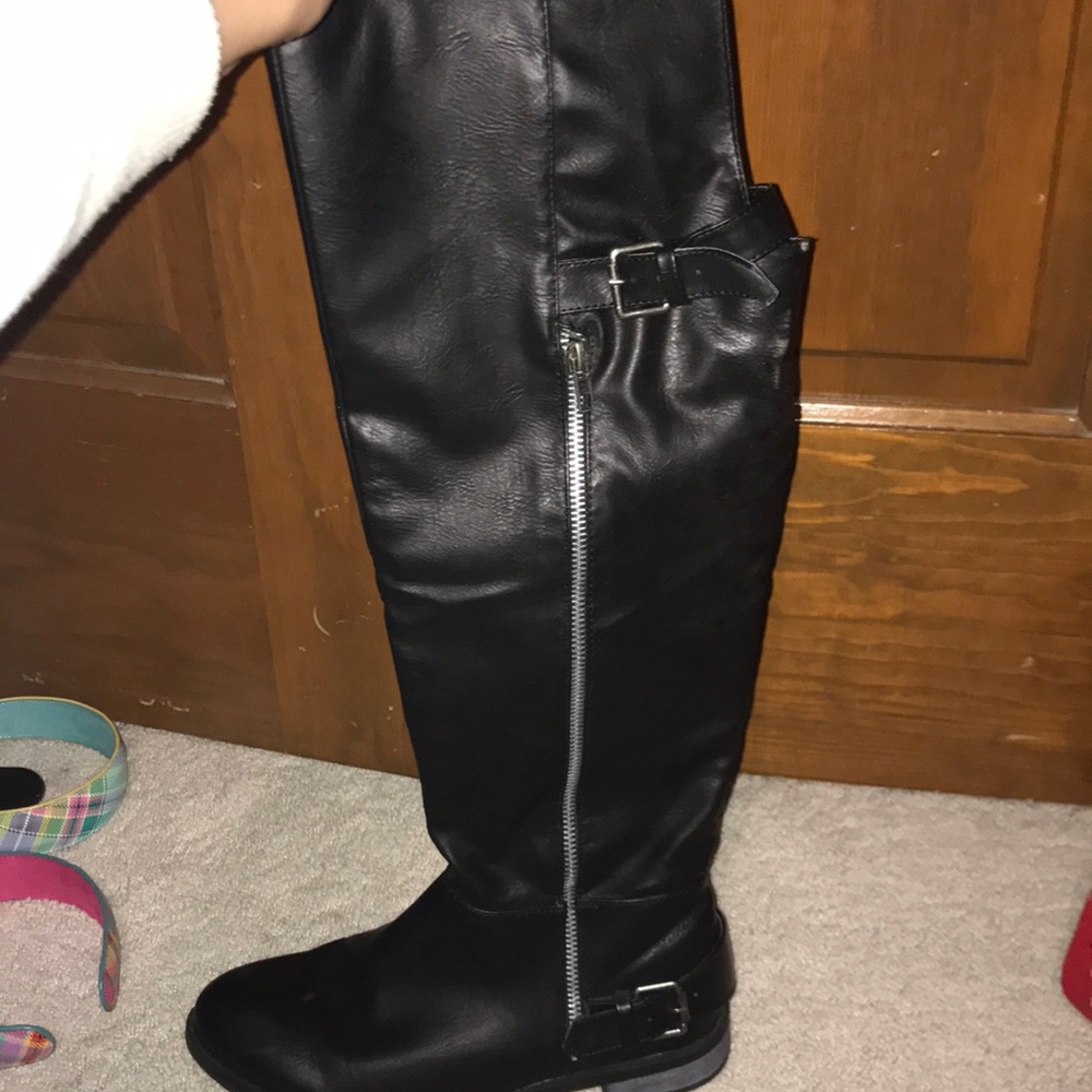 Restricted Black leather knee high boots